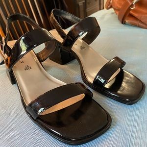 Chunky heeled, square toe strap sandals.